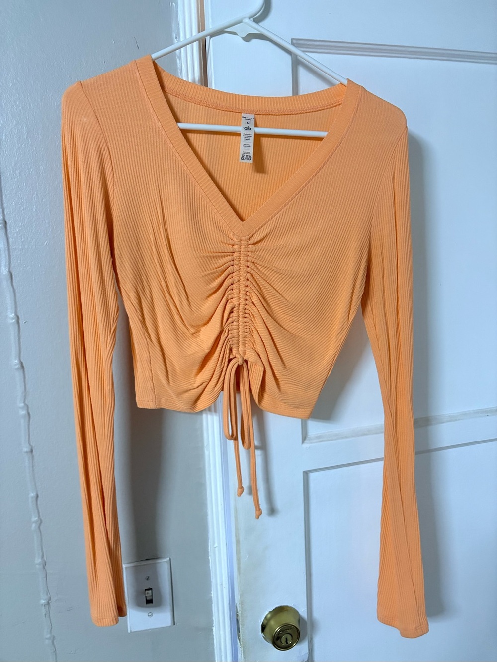 ALO Ribbed Drawstring V-Neck Long Sleeve Top - Peach